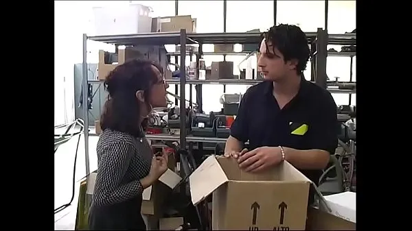 显示Sexy secretary in a warehouse by workers驱动器剪辑