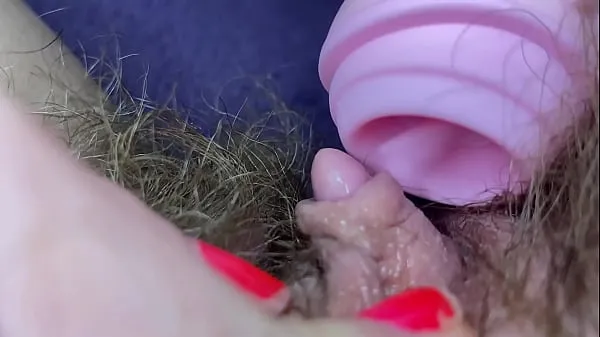 Prikaži Testing Pussy licking clit licker toy big clitoris hairy pussy in extreme closeup masturbation posnetke pogona