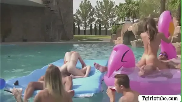 Show Busty shemales are in the swimming pool with many guys that,they decide to do orgy and they start kissing each is,they suck their big cocks passionately and they let them bareback their wet ass too drive Clips