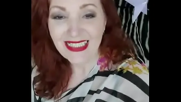 Show lady in black and white blouse drive Clips