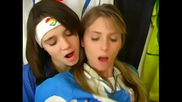 Girls from argentina and italy football uniforms have a nice time at the locker room 드라이브 클립 표시