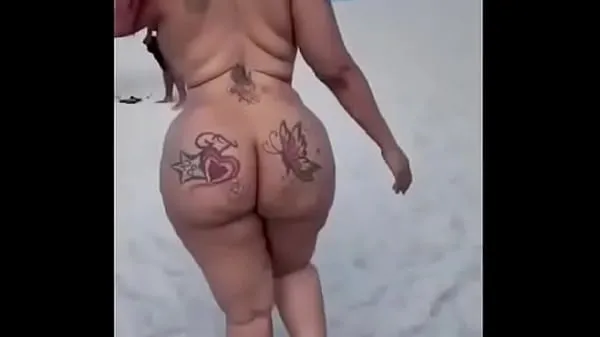 Vis Black chick with big ass on nude beach stasjonsklipp