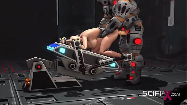 Vis Sci-fi male sex cyborg plays with a sexy young hottie in restraints in the lab stasjonsklipp